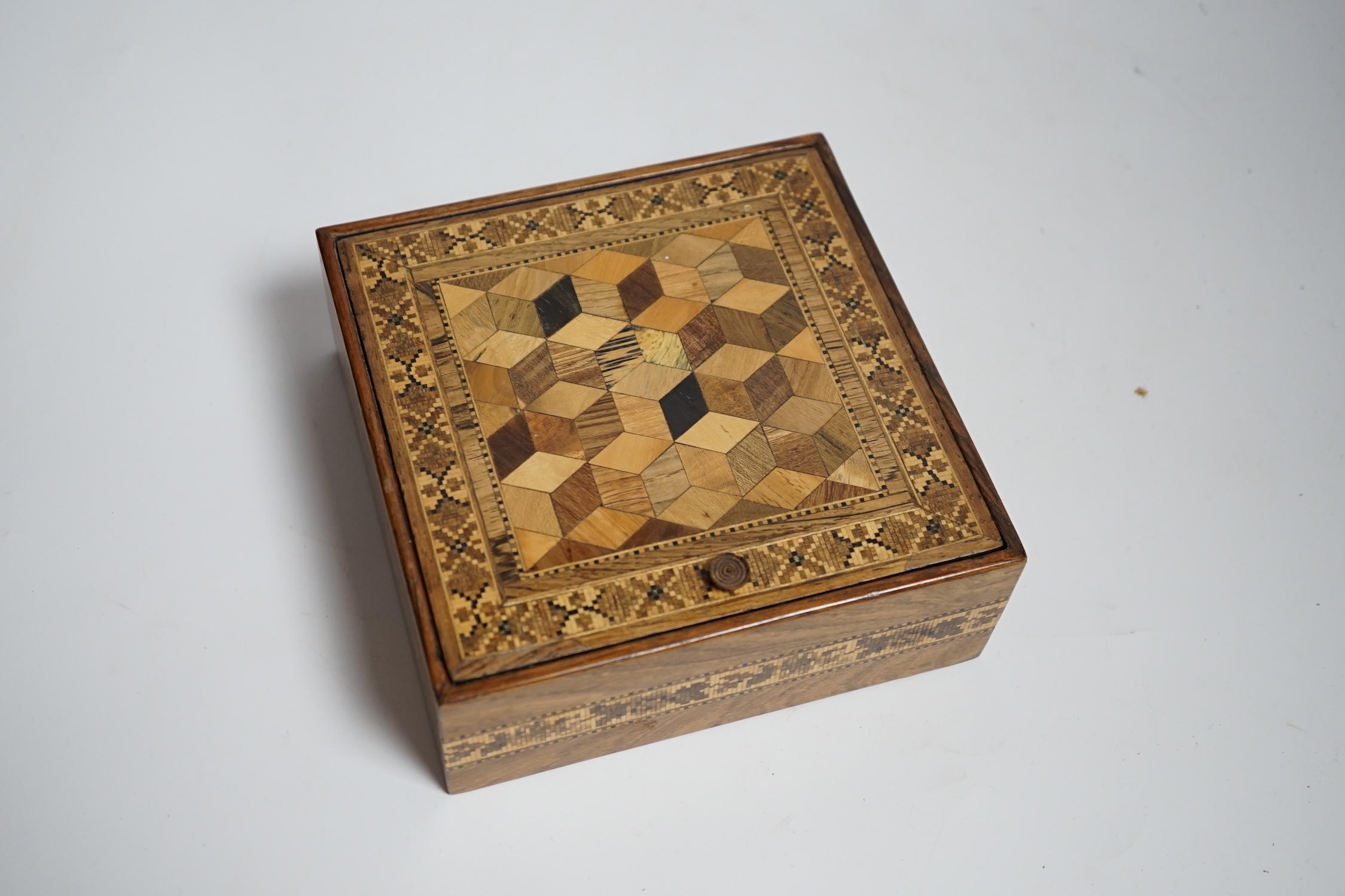 A 19th century Tunbridge ware perspective cube marquetry box, 15cmsq